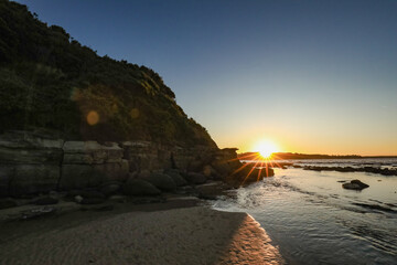 Wall Mural - Sunset over rocky shelf at Norah Head, New South Wales Australia