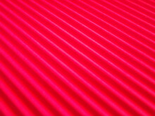 Red Background With Longitudinal Radial Stripes