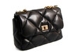 quilted leather bag in black. Women's fashionable clutch isolate on a white background. hand bag with handle. fashion trends 2022. High quality photo