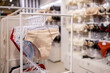 © volody10 - Women's basic cotton beige panties on the shelf in the lingerie store. Lingerie store with a modern design.