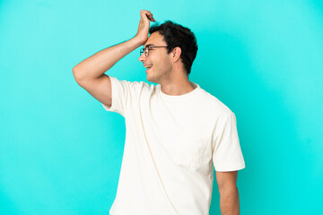 Caucasian handsome man over isolated blue background has realized something and intending the solution