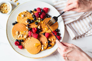 Canvas Print - Summer homemade pancakes with raspberries, currants and peanut butter.