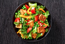 Tofu Salad With Greens And Vegetables In Bowl