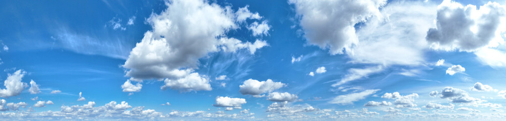 Wall Mural - white clouds against blue sky background