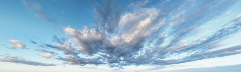 Wall Mural - white clouds against blue sky background