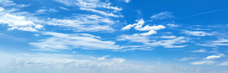 Wall Mural - white clouds against blue sky background
