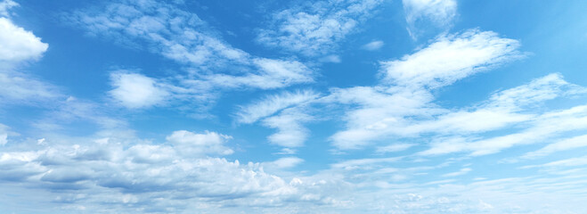 Wall Mural - white clouds against blue sky background