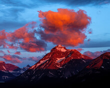 Beautiful Sunrise Clouds Over Montana Rocky Mountain Peak