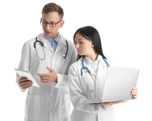 Wall Mural - Medical assistants with laptop and tablet computer on white background