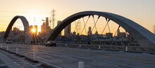 Lens Flare At Sunset On The 6th Street Bridge In Los Angeles With The Skyline In The Distance