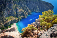 The Butterfly Valley Near Fethiye Is A Famous Beautiful Place On Lycian Path, Faralya. Blue Lagoon Surrounded By Mountains. The Coast Of This Place Can Only Be Reached By Boat.