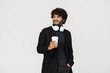 © Drobot Dean - Young adult indian handsome curly man with coffee
