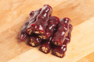 National caucasian dessert churchkhela on the cutting board