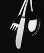 photo of black and white kitchen cutlery