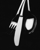 Fototapeta Sawanna - photo of black and white kitchen cutlery
