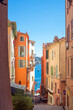 © Лариса Люндовская - Villefranche-sur-Mer, France, September 2021. Old narrow authentic street of the city of Villefranche-sur-Mer in the French Riviera resort. Journey along the Cote d'Azur.