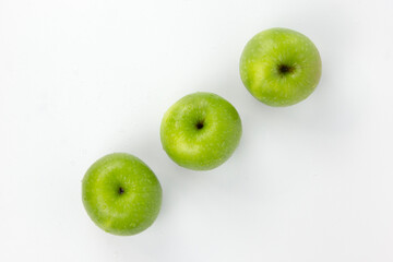 Wall Mural - GROUPs of Healthy apple isolated on a white background, Green organic apples used in fruits ads concepts