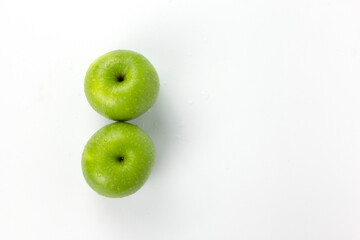 Poster - Two ripe green apples isolat on white background, fresh green apples fruit for healthy cooking concept