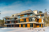 Fototapeta Uliczki - Modern exterior of new luxury residential building at winter.