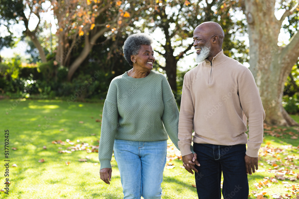 Image of happy african american senior couple in garden Stock Photo ...