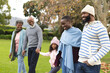 © WavebreakMediaMicro - Image of happy multi generation african american family having fun outdoors in autumn