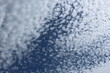 cirrocumulus cloudscape - fluffy white clouds on blue sky background