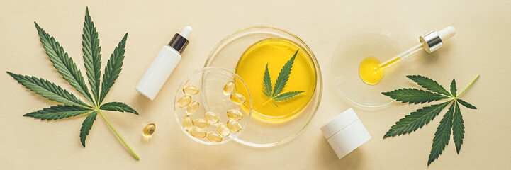 Wall Mural - Skin care cosmetics with CBD oil and cannabis in a white mock-up package