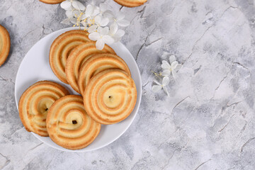 Wall Mural - Round ring shaped spritz biscuits, a type of German butter cookies made by extruding dough with a press fitted with patterned holes