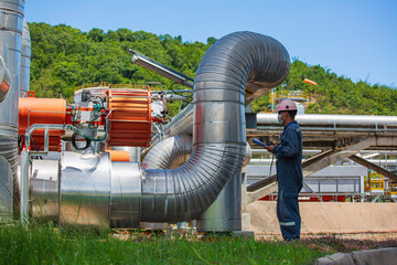 Sticker - Male worker inspection at steel long pipes and pipe elbow in station oil factory during refinery valve of visual check record pipeline oil and gas