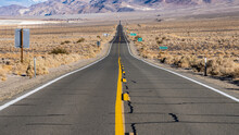 Road Amidst Barren Land At Death Valley