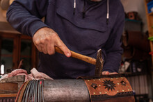 Anonymous Artisan Making Drum Shell In Workshop