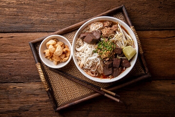 khanom jin nam ngiao. rice noodles with spicy pork sauce. northern thailand traditional lanna food.