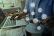 © New Africa - Internet marketing. Different virtual icons and businessman working on modern laptop at table, closeup