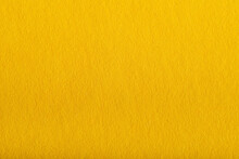Macro Texture Of Colored Yellow Paper