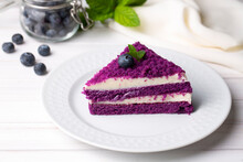 A Deliciously Looking Slice Of Purple Velvet Cake