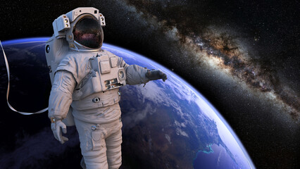 Wall Mural - astronaut during spacewalk in earth orbit