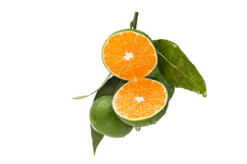 Wall Mural - whole and sliced mandarin tangerine or clementine with green leaf on white background.