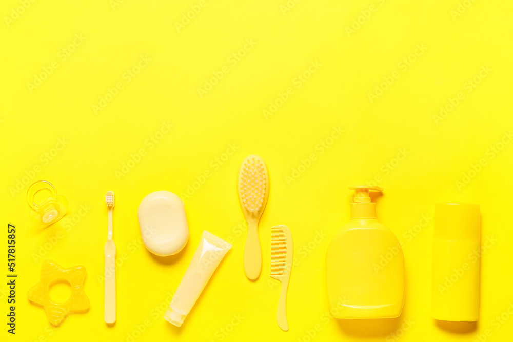 Bath accessories for baby on yellow background
