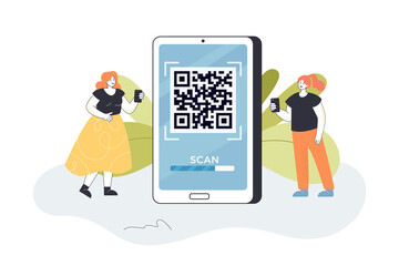 Wall Mural - two women standing next to big smartphone with qr code on screen. girls paying by scanning barcode f