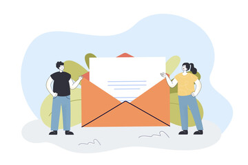 Wall Mural - man and woman standing next to huge open envelope with paper. characters talking via letters or e-ma