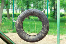 Suspended Car Tire Wheel For Dog Training In Park