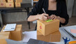 © PaeGAG - Starting small businesses SME owners female entrepreneurs check online orders to prepare to pack the boxes, sell to customers, sme business ideas online.