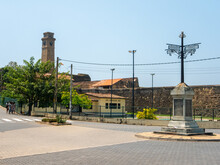 Galle, Sri Lanka - March 12, 2022: View Of The Dutch-built Galle Fort And The Old Large Clock Tower Built In 1883. Pointer With Landmarks At A Crossroads In The City Of Galle