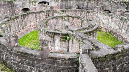 Old-world Intramuros is home to Spanish-era landmarks like Fort Santiago, with a large stone gate and a shrine to national hero José Rizal.