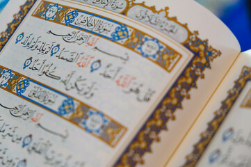 Wall Mural - quran open book page closeup