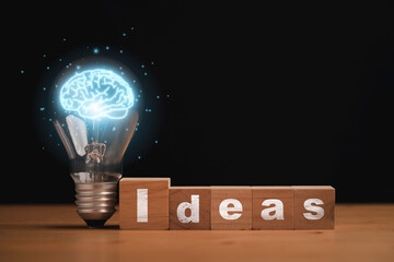 Wall Mural - Virtual blue brain inside of lightbulb with Idea wording on wooden cube block for creative thinking idea and problem solving after study knowledge concept.