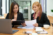 © Jirapong - Portrait of an Asian businesswoman consulting, start up a marketing plan to meet the needs of customers in office room.