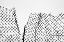 Torn Metal Wire Mesh. Illustration Of Chain Link Fence With Hole Isolated On White Background. Prison Barrier, Secured Property. Damage Net Fence Isolated On White Sky Background. Mesh Netting.