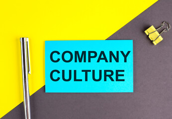 COMPANY CULTURE text written on sticky with pen on grey, yellow background, business concept