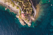 Aerial View Of A Small House On The Promontory Along The Coast On Elba Island, Italy.